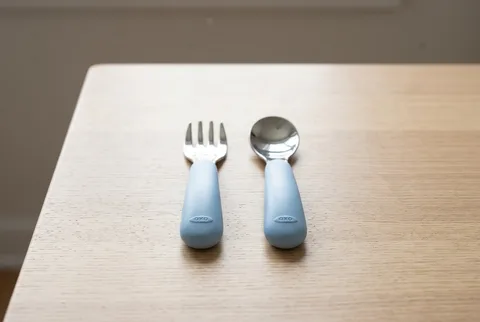 OXO Tot Fork and Spoon Set in Dusk with stainless steel heads and soft grips