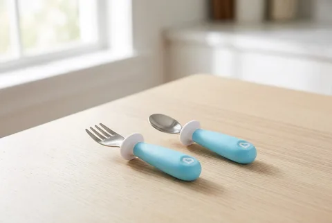 Munchkin Raise Toddler Fork and Spoon Set with raised base keeping tips off table
