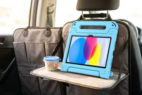 iPad in a light blue kids foam case on a car back-seat organizer tray with a small snack cup
