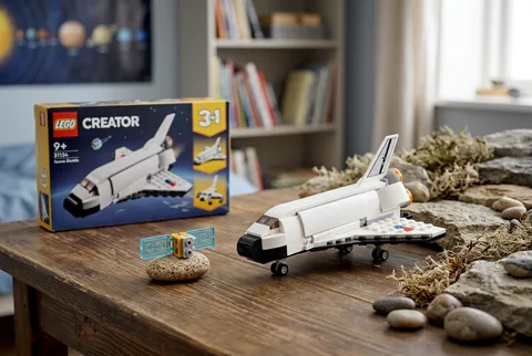 LEGO Creator 3-in-1 Space Shuttle set 31134 assembled beside its small satellite